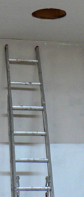 ladder and Solatube hole in the ceiling