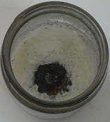 Another well placed stone and wick, but in this case there was more soy at the bottom so the flame went out more cleanly